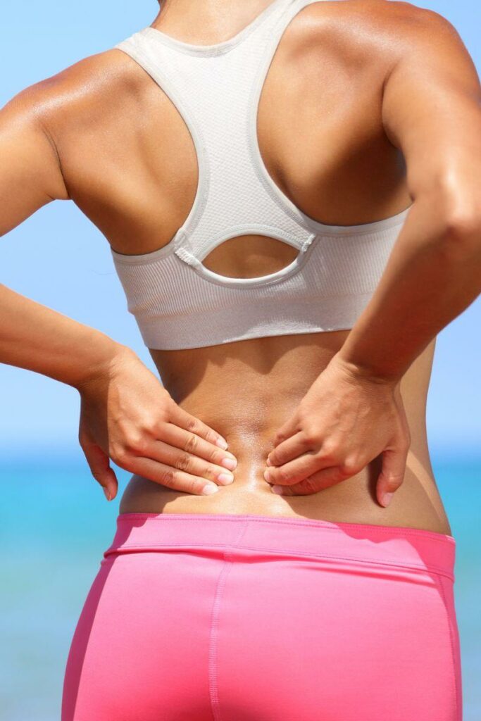 Female suffering back pain